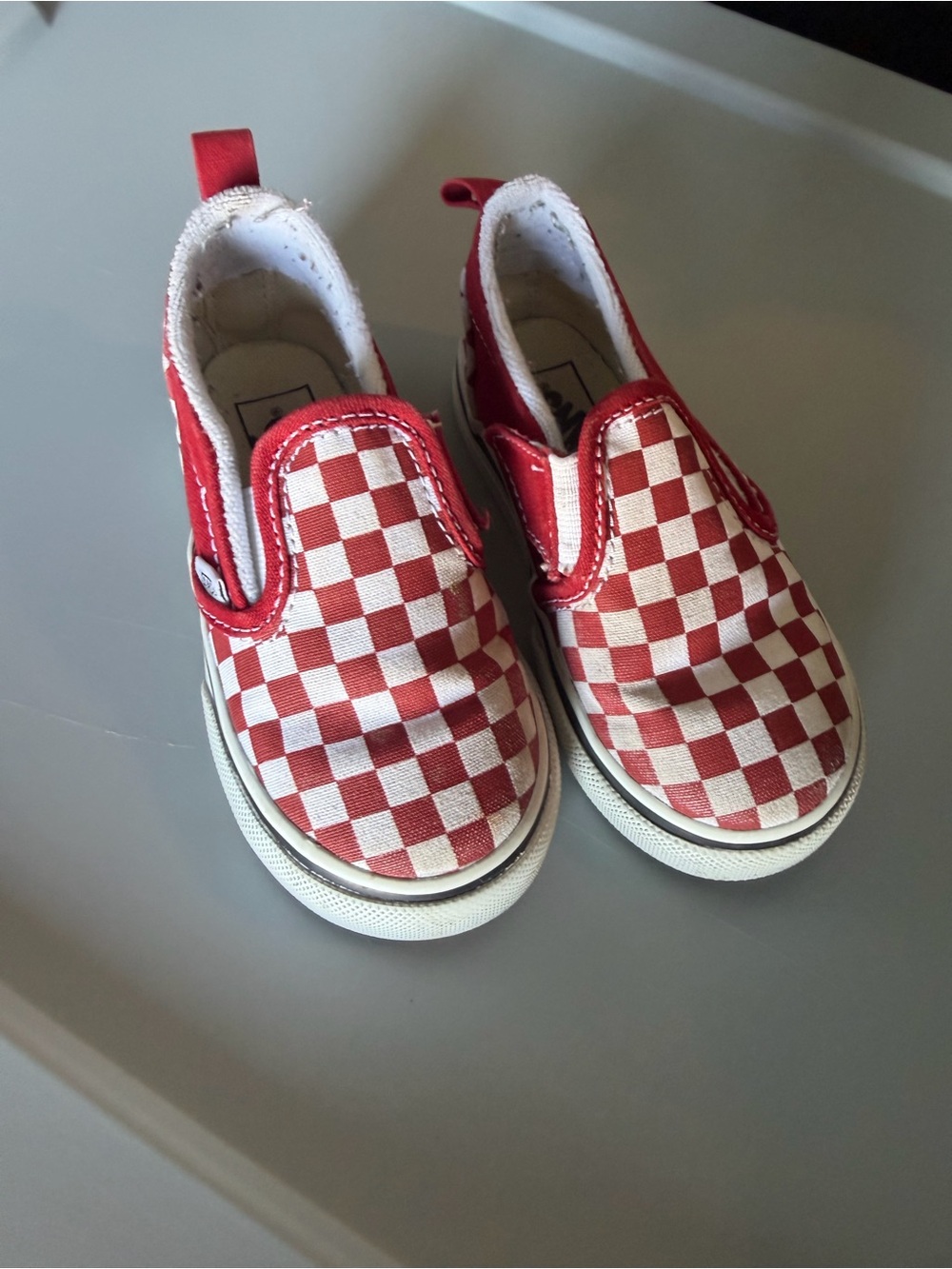 Vans Kids Red and White Checkerboard Slip-On Sneakers